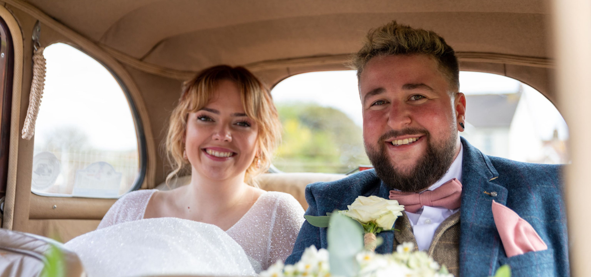 Image of beautiful smiling bride and husband. Brides hair dressed by Bethany Eleanor Mobile Hair & Beauty